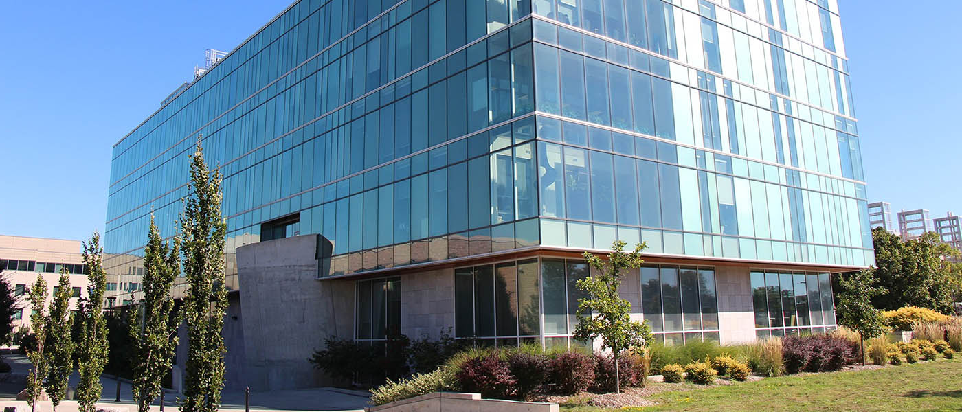 Large building covered in glass.